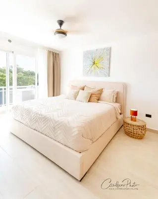 a white bed in a white bedroom with a window at Estrella Garden Shaula 301 New Modern Penthouse in La Laguna