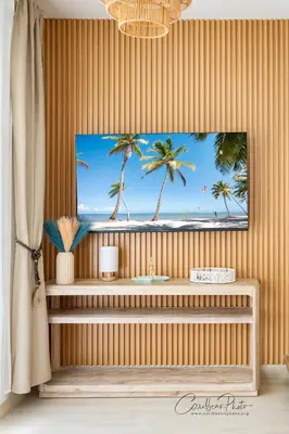 a bathroom with a picture of palm trees on the wall at Estrella Garden Shaula 304 New Modern Penthouse in La Laguna