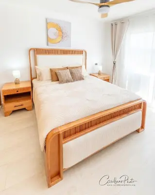 a bedroom with a large bed with a wooden frame at Estrella Garden Shaula 304 New Modern Penthouse in La Laguna
