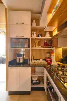 a kitchen with white cabinets and a counter top at Increíble ático de lujo con impresionantes vistas in Puerto Plata