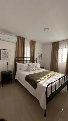 a bedroom with a large bed in a room at Apartamento en La Romana 3 habitaciones in La Romana