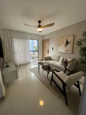 a living room with a couch and a table at Apartamento en La Romana 3 habitaciones in La Romana
