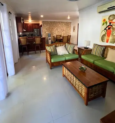 a living room with couches and a coffee table at Apartamento Rosa Hermosa in Punta Cana