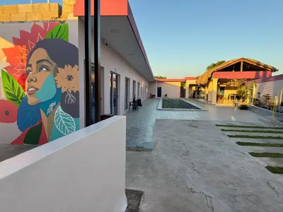 a mural of a woman on the side of a building at Terra Mia Villa in Pedernales