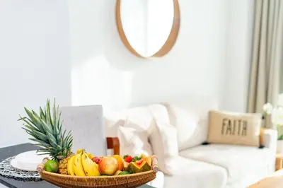a bowl of fruit on a table in a living room at Couples PH @ Cana Rock Star with Great Golf Views in Punta Cana