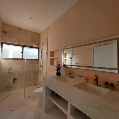 a bathroom with a large sink and a toilet at Villa Olam in Las Galeras