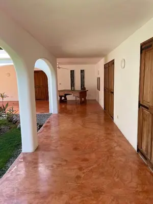 an empty hallway in a house with a table at Villa Louana in Las Terrenas