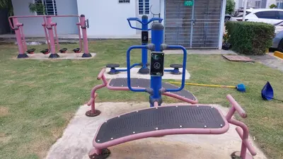 a playground equipment in a yard with at This beautiful apt you can have a nice vacation in Santo Domingo