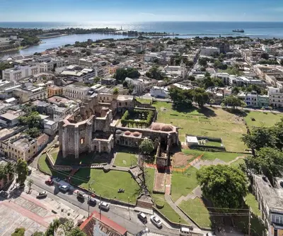 an aerial view of a city with a castle at Colonial Home with Private Terrace and Jacuzzi in Santo Domingo