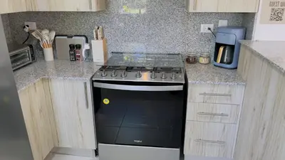 a kitchen with a stove and a counter top at Apartamento Armonía-K-204 in Las Terrenas