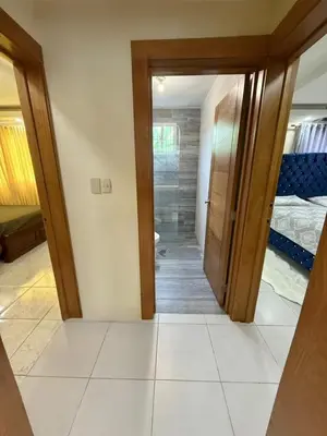 a hallway with a door leading to a bedroom at Villa San Pedro in San Pedro de Macorís