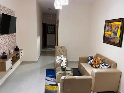 a living room with a couch and a table at Residencial Torre del Atlantico in Puerto Plata