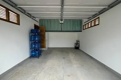 an empty room with a white wall and windows at 5 Bedroom Villa With BBQ and Washer in Las Terrenas