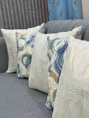 a group of pillows sitting on a couch at Moderna casa cerca del aeropuerto SDQ y de mi rent cars in La Caleta