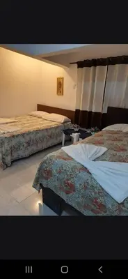 a hotel room with two beds in a room at B&B KeisyAlba Punta Rucia in Punta Rucia