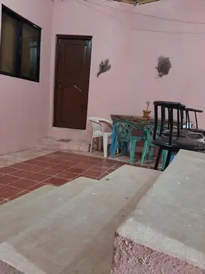 a room with a table and chairs in a room at B&B KeisyAlba Punta Rucia in Punta Rucia