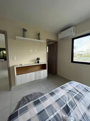 a bedroom with a bed and a sink and a window at Villa Medrano