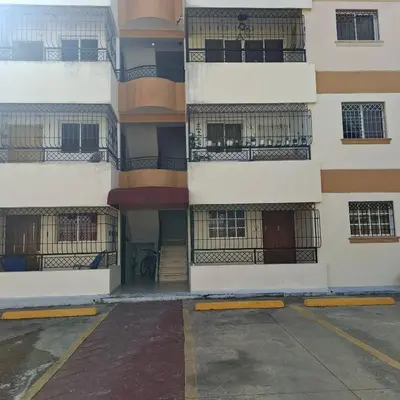an empty parking lot in front of a building at Las Palmas in Santiago de los Caballeros