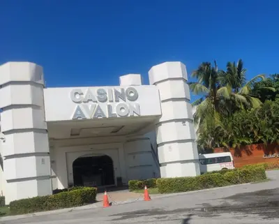 a building with a sign that reads ana reunion at Residencial El Carey in Punta Cana