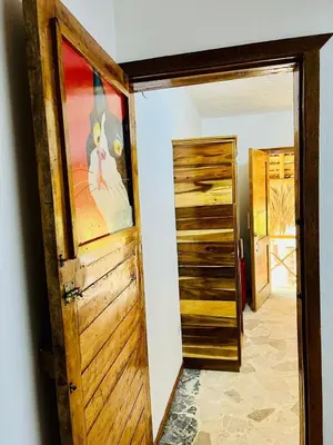 an open door in a room with a room with a closet at La Cabañita de Jardín del Coco in Las Galeras