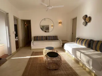 a living room with a couch and a table at Rose&mary in Las Terrenas