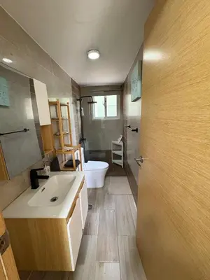 a bathroom with a sink and a toilet and a tub at Boca paraiso in Boca Chica