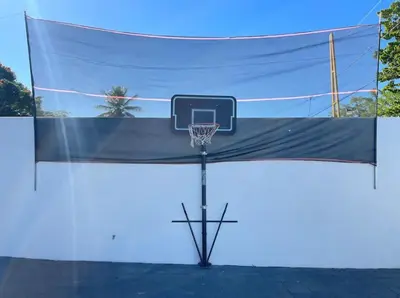 a basketball hoop with a net on top of it at Villa Ferrer I in Jarabacoa