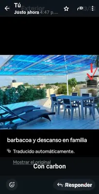 a screenshot of a website with a table and an umbrella at Dominique ugolin in Mata Chalupe