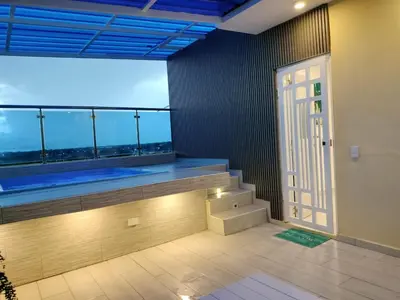 an empty room with a large window with a view at Dominique ugolin in Mata Chalupe