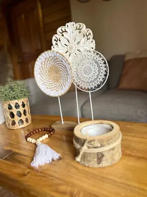 a table with three different types of plates on it at Estaciones de Jarabacoa-Mountain Lodge in Jarabacoa