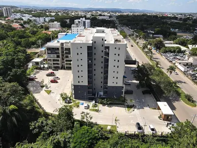 an overhead view of a large building with a parking lot at 3BR Condo by the Airport Pool Gym Parking Security in Santiago de los Caballeros
