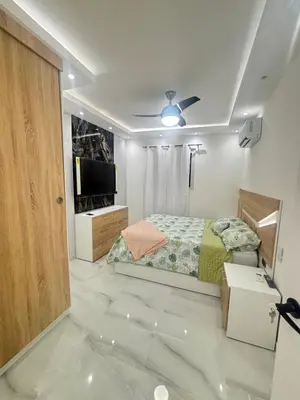 a bedroom with a bed and a flat screen tv at Villa la pal de 4 in La Ureña
