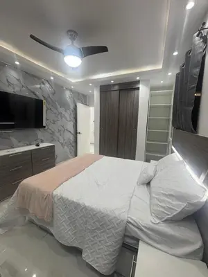 a bedroom with a bed and a ceiling fan at Villa la pal de 4 in La Ureña