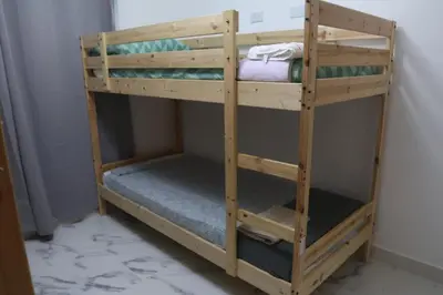 a pair of bunk beds in a room at Villa Yvelisse Pop Un paraíso próximo al Mar in San Felipe de Puerto Plata