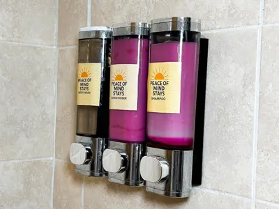 a group of three lip balms on a wall at Haven Villa Retreat Jacuzzi Oasis for 16 in Mata los Indios