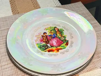 a plate with a picture of two people on it at Haven Villa Retreat Jacuzzi Oasis for 16 in Mata los Indios