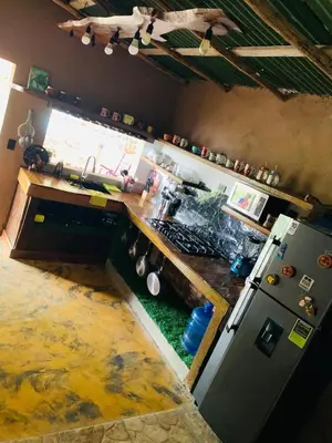an aerial view of a kitchen with a counter and a sink at Villa el privilegio in Jarabacoa
