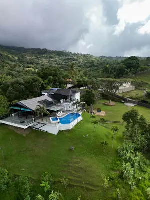 an aerial view of a house with a swimming pool at Villa Ana in Santiago de los Caballeros