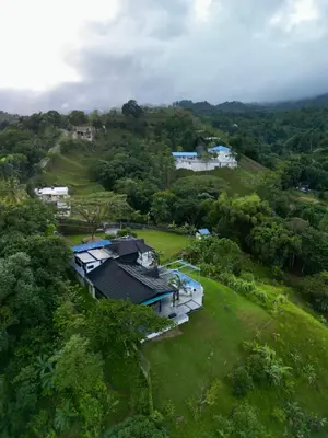 an aerial view of a house on a hill at Villa Ana in Santiago de los Caballeros