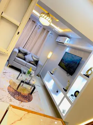 an overhead view of a living room with a couch and a television at Skyline Stays in La Viva