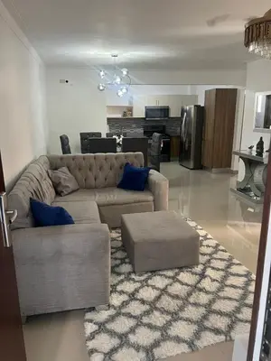 a living room with a couch and a rug at The perfect destination to relax in Santiago de los Caballeros