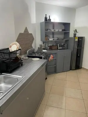 a kitchen with a sink and a counter top at Apartamento en el Corazón de Las Terrenas in Las Terrenas