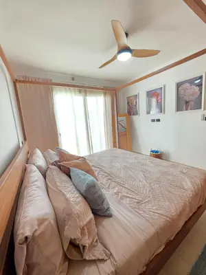 a bedroom with a bed with a ceiling fan at Estrella Garden Shaula 104 New Modern Apartment in La Laguna