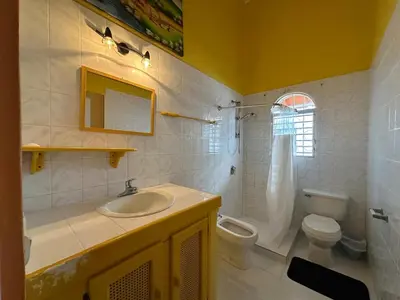 a bathroom with a sink and a toilet at Casa pintada - 4 people, 4 minutes from the beach in Las Galeras