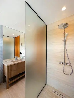 a bathroom with a shower and a sink at Luxury Guesthouse Villa with Golf Cart - Casa de Campo in La Romana