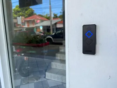 a close up of a door with a blue sign on it at Plaza Achim 6A, Modern APT 250m from Sosua beach! in Sosúa