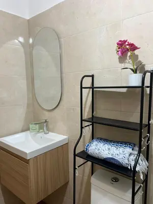 a bathroom with a sink and a mirror at Bright studio in the heart of Las Galeras in Las Galeras