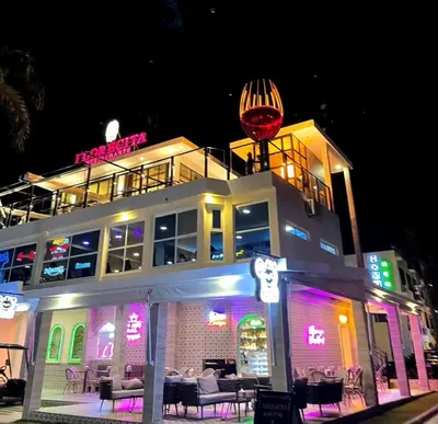 a building with a restaurant with a ball on top of it at Luxury Villa in Punta Cana in Punta Cana