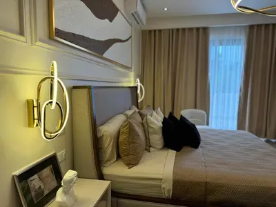 a hotel room with a bed with pillows on it at Luxury Villa in Punta Cana in Punta Cana