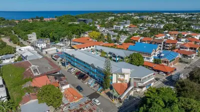 an overhead view of a town with a train at Centric Studio in Sosua Center Pool & Workspace in Sosúa